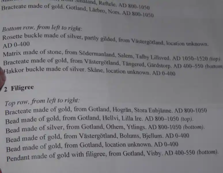 A rounded swastika silver buckle